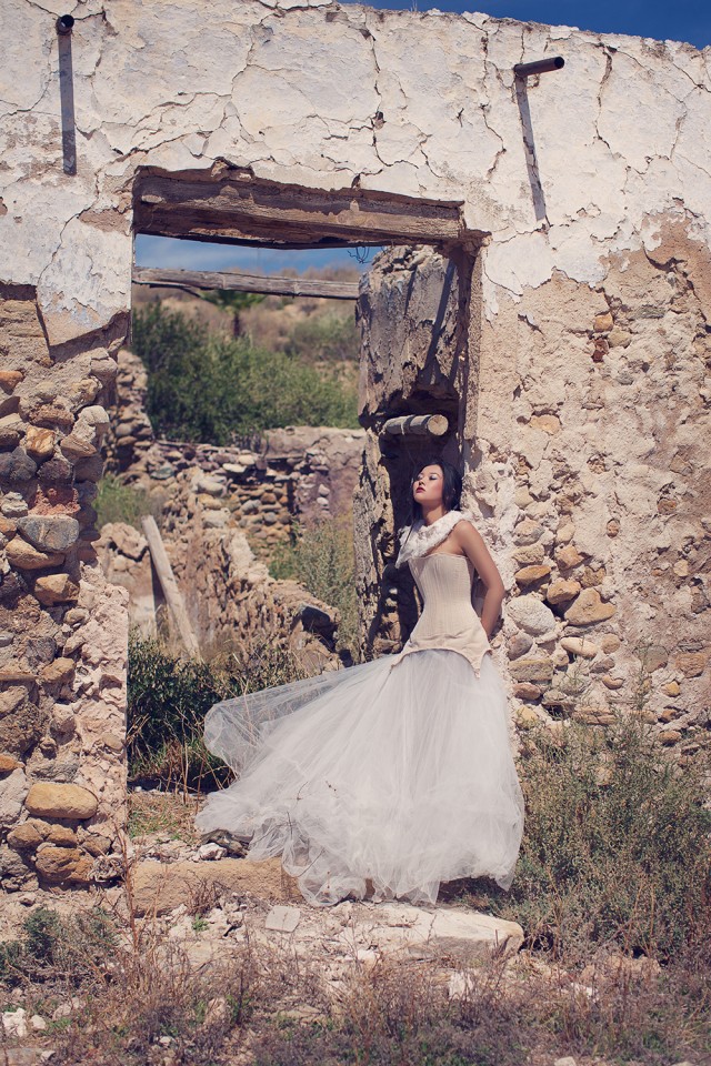 Long line corset dress paired with textured collar piece and tulle skirt